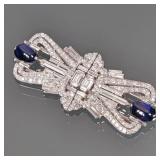 ART DECO BURMESE SAPPHIRE, DIAMOND & PLATINUM CLIP BROOCH | A pair of art deco fur clips joined on a
