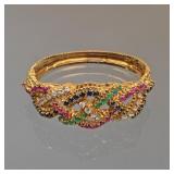 JACK GUTSCHNEIDER FLORAL GEMSTONE & 18K GOLD BRACELET | Midcentury modern, hinged hard bracelet with