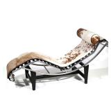 LE COURBOSIER LOUNGE CHAIR, HORSE HIDE | Having hide upholstered seat and cushion attached with elas