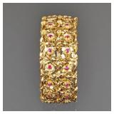 ITALIAN RUBY & 18k GOLD BRACELET |Hard yellow gold bangle bracelet with hinged opening, designed as 
