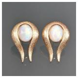 PAIR OPAL CABOCHON & 14K GOLD EARRINGS | Post back earrings, each mounted with an oval opal approx. 