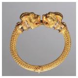 GREEK 18K DOUBLE CHIMERA BRACELET | Flexible, woven 18k yellow gold bracelet, featuring two large Ch