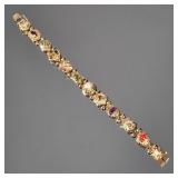 COLORFUL GEMSTONE & 14K BRACELET | Designed as 12 unique links (one is a clasp) each mounting a diff
