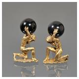 ATLAS ONYX & 14K GOLD FIGURAL CUFFLINKS | A pair of 14k yellow gold cuff links depicting the Greek g