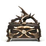 ANTIQUE BLACK FOREST ANTLER DECORATED BOX |19th century, the carved wooden box with applied antler d