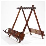 LEWIS DRAKE & ASSOCIATES FOLDING TRAVEL GUN RACK | Folding wood travel gun rack, applied stitched le