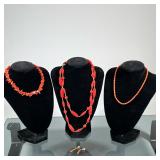 CARVED CORAL JEWELRY | Mixed lot of carved coral jewelry including: intricately carved double-strand