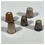(5pc) MIXED THIMBLES | Mixed lot of thimbles including: Sterling silver thimble (0.2 ozt). 2 silver 