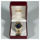 Men’s Belair Quartz Watch | Having muted gold strap and dark blue face. Comes in original box. Dimen