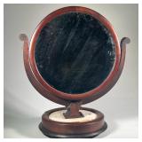 ROUND MIRROR IN STAND | Round mirror with carved wood frame on inlaid marble & wood base, mirror 17.