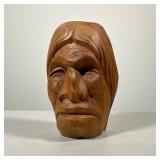 WOOD CARVING OF NATIVE AMERICAN SUBJECT | Hand-carved single-piece wooden head depicting an Indigeno