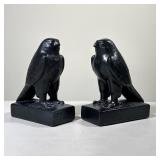PAIR BLACK CERAMIC FALCON BOOKENDS | Pair of black painted falcon figures mounted on rectangular pli