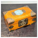 CHINESE JEWELRY BOX WITH BRASS TRIM AND JADE INLAY | A small wooden jewelry box featuring brass trim