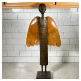 Folk Art Tall Angel Statue | Of different metals on wooden base. Dress features a fish design. Dimen