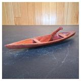 Carved Wood Model Canoe | Of nicely figured wood, with a smooth finish Dimensions: l. 15.25 in