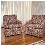 PAIR OF C.R. LAINE ARM CHAIRS | This set includes two traditional style armchairs featuring a bold, 