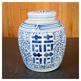 Chinese Blue & White Ginger Jar | With blue and white geometric patterns throughout, and a round lid