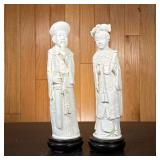 Pair of resin Chinese Figures | Bone-style resin carved male and female imperial figures, with round