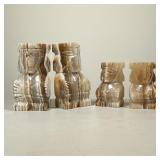 TWO SETS OF CARVED STONE BOOKENDS | Dimensions: h. 8 x w. 4 x l. 3 in (largest)