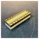 Inlaid Wood Dice Box | With a sliding lid Dimensions: h. 1.25 x w. 1.5 x l. 4.5 in