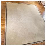 LARGE BEIGE CARPET | Overall beige colored with green and red accented border Dimensions: w. 144 x l
