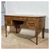 LOUIS XVI-STYLE LEATHER-INSET KNEEHOLE DESK | Kneehole desk in a Louis XVI–inspired form. Leather to