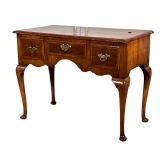 A GEORGE II WALNUT DRESSING TABLE