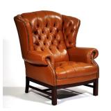 VINYL TUFTED WING CHAIR WITH NAILHEAD TRIM