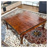 PARQUETRY VENEER LOW COFFEE TABLE WITH X-STRETCHER AND CARVED LEGS