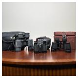 (3pc) GALILEO G-1050WA 10X50 AND TWO VINTAGE NIKON BINOCULARS WITH CASES