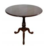 ETHAN ALLEN TILT-TOP PEDESTAL TABLE | Round tilt-top pedestal table in a dark mahogany-tone finish w