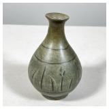 #20 CELADON-GLAZED STONEWARE BOTTLE VASE WITH INCISED FLORAL MOTIF | Celadon-glazed stoneware bottle