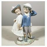 #60 LLADRÓ (SPAIN) PORCELAIN FIGURE OF TWO CHILDREN | Glazed porcelain figural group depicting two c