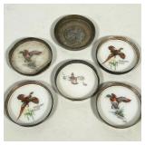 #67 (6pc) GROUP OF COASTERS INCLUDING FIVE SILVER-RIMMED PORCELAIN INSERTS BY STUART BRUCE | Group o