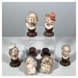 #69 (6pc) BISQUE PORCELAIN CHARACTER BUSTS, SIGNED GILARDI, ON WOOD BASES | Group of six polychrome-