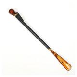 ITALIAN AMBER-TONE AND EBONIZED WOOD SHOEHORN, MADE IN ITALY LABEL | Black ebonized wood shaft with 