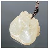 CARVED WHITE JADE PENDANT ON STERLING SILVER NECKLACE | Carved white jade pendant carved in low reli