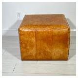 LILLIAN AUGUST LEATHER-WRAPPED CUBE OTTOMAN (1 of 2) | Cube ottoman fully wrapped in a tan/caramel l
