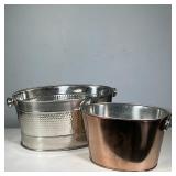PAIR OF HAMMERED STAINLESS STEEL BEVERAGE TUBS | Two oval hammered stainless-steel beverage tubs, on