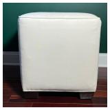 WHITE UPHOLSTERED CUBE OTTOMAN WITH WOOD BLOCK FEET | Cube ottoman upholstered in off-white woven fa