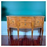 NEOCLASSICAL CARVED WOOD SIDEBOARD WITH RING PULLS | Neoclassical-style carved wood sideboard with a