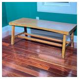 MID-CENTURY MODERN WOOD COFFEE TABLE | Rectangular wood coffee table with a solid top, splayed squar
