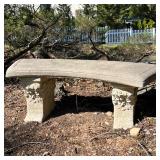 CONCRETE GARDEN BENCH WITH FLORAL-RELIEF PEDESTALS | Cast concrete garden bench with gently curved r