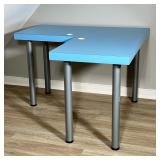 BLUE L-SHAPE LAMINATE OFFICE DESK WITH METAL LEGS | Blue L-shaped laminate top mounted on five cylin