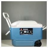 IGLOO MAXCOLD 40 QT ROLLING WHEELED COOLER | Blue molded plastic Igloo cooler with white hinged lid 