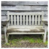 SLATTED TEAK GARDEN BENCH | This outdoor garden bench is constructed from teak wood with a naturally