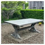 CUSTOM MADE STEEL AND TEAK TRESTLE BASE OUTDOOR TABLE | Rectangular dining table featuring a steel t