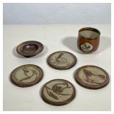 JAPANESE STUDIO POTTERY TEA CUP, SAUCER, AND FOUR COASTERS WITH ANIMAL MOTIFS | Studio pottery set c