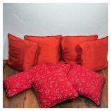 (8pc) SEVEN RED DECORATIVE ACCENT THROW PILLOWS | This lot consists of seven square decorative throw