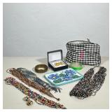 ASSORTED COSTUME JEWELRY AND ZIPPERED ACCESSORY POUCHES | This collection features multiple multi-st